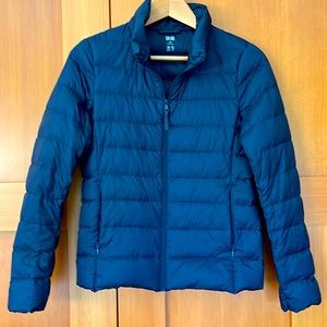Women’s Uniqlo ultralight down jacket in navy, size xxs.